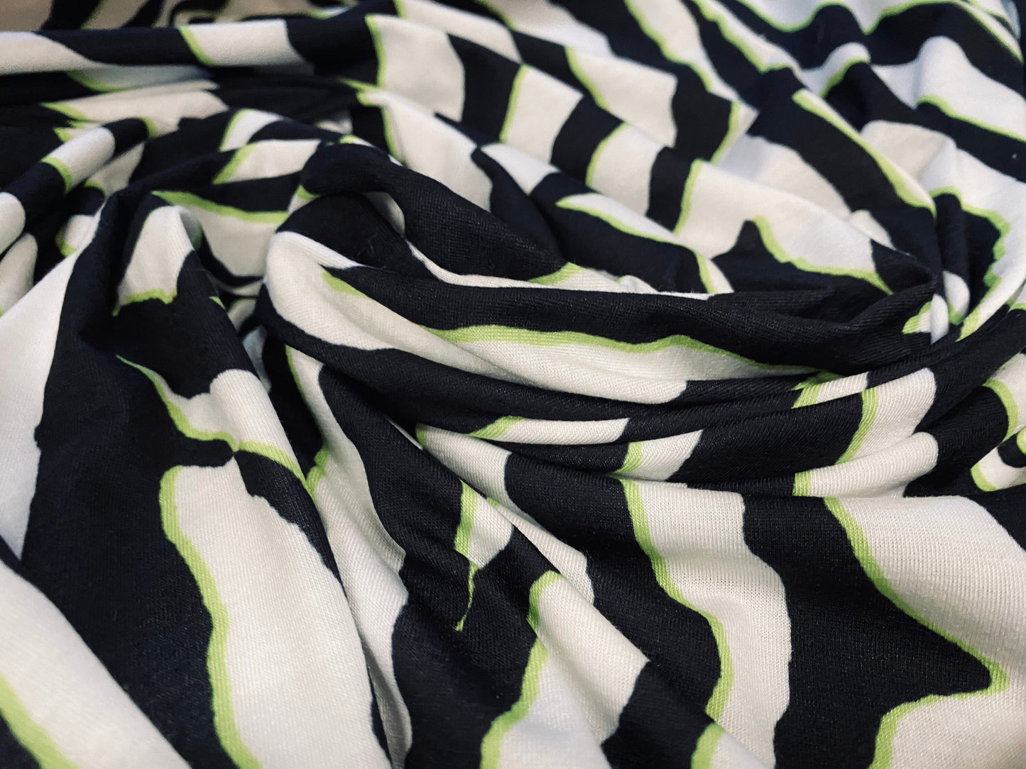 Soft handle jersey dress  fabric, per metre - black white & yellow zebra print