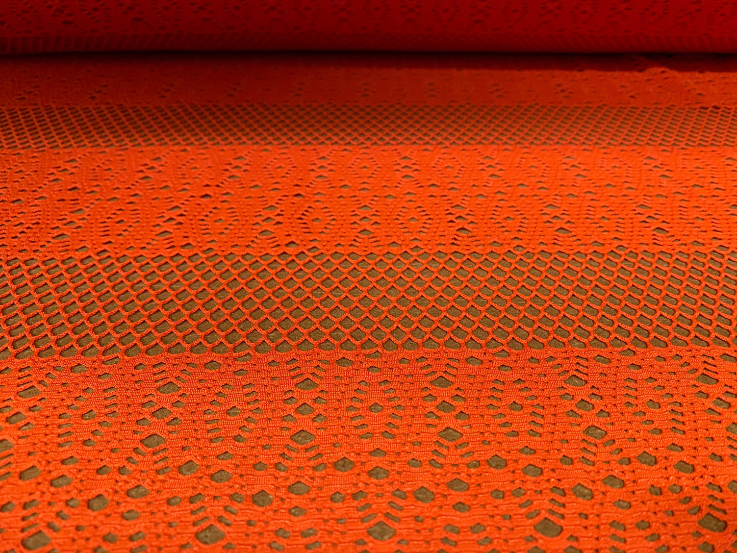 Fishnet stretch mesh floral spandex jersey fabric, per metre - Orange