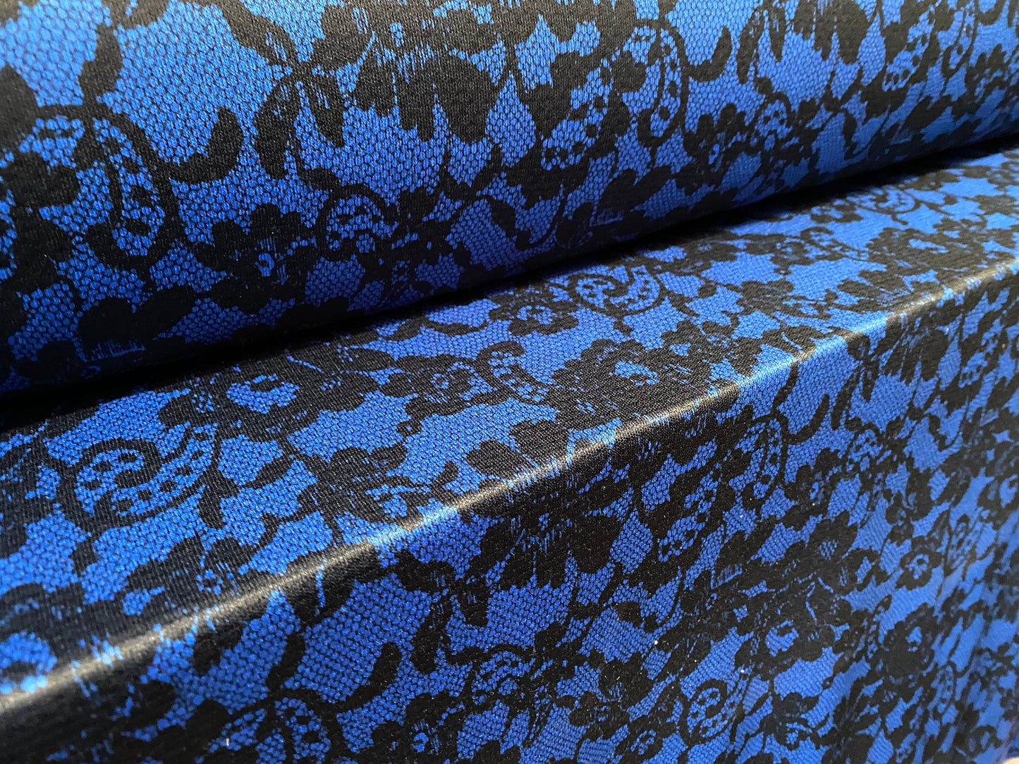 Single jersey fabric with One way stretch, per metre - royal blue with black lace print