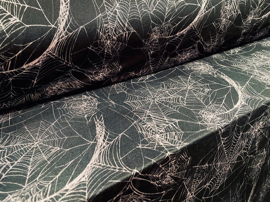 Disco shimmer spandex stretch jersey fabric, per metre - black & Nude cobweb print