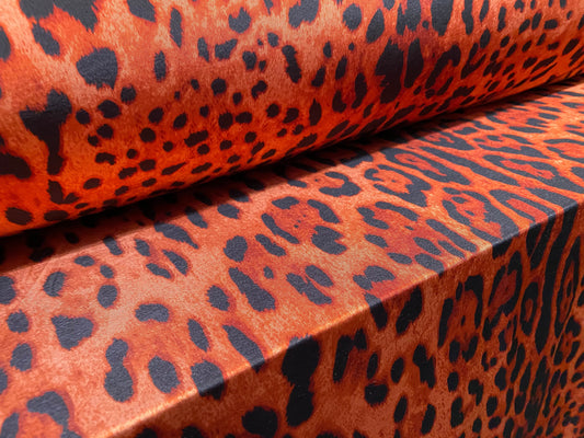 Disco shimmer stretch spandex jersey fabric, per metre - Red leopardskin print