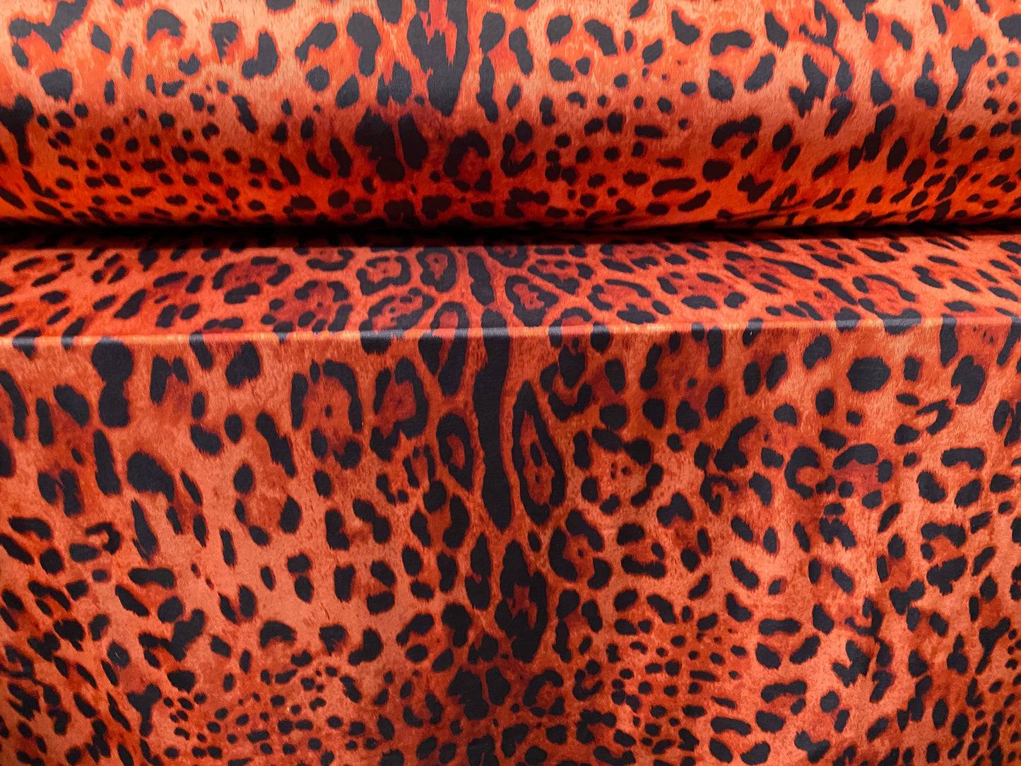 Disco shimmer stretch spandex jersey fabric, per metre - Red leopardskin print