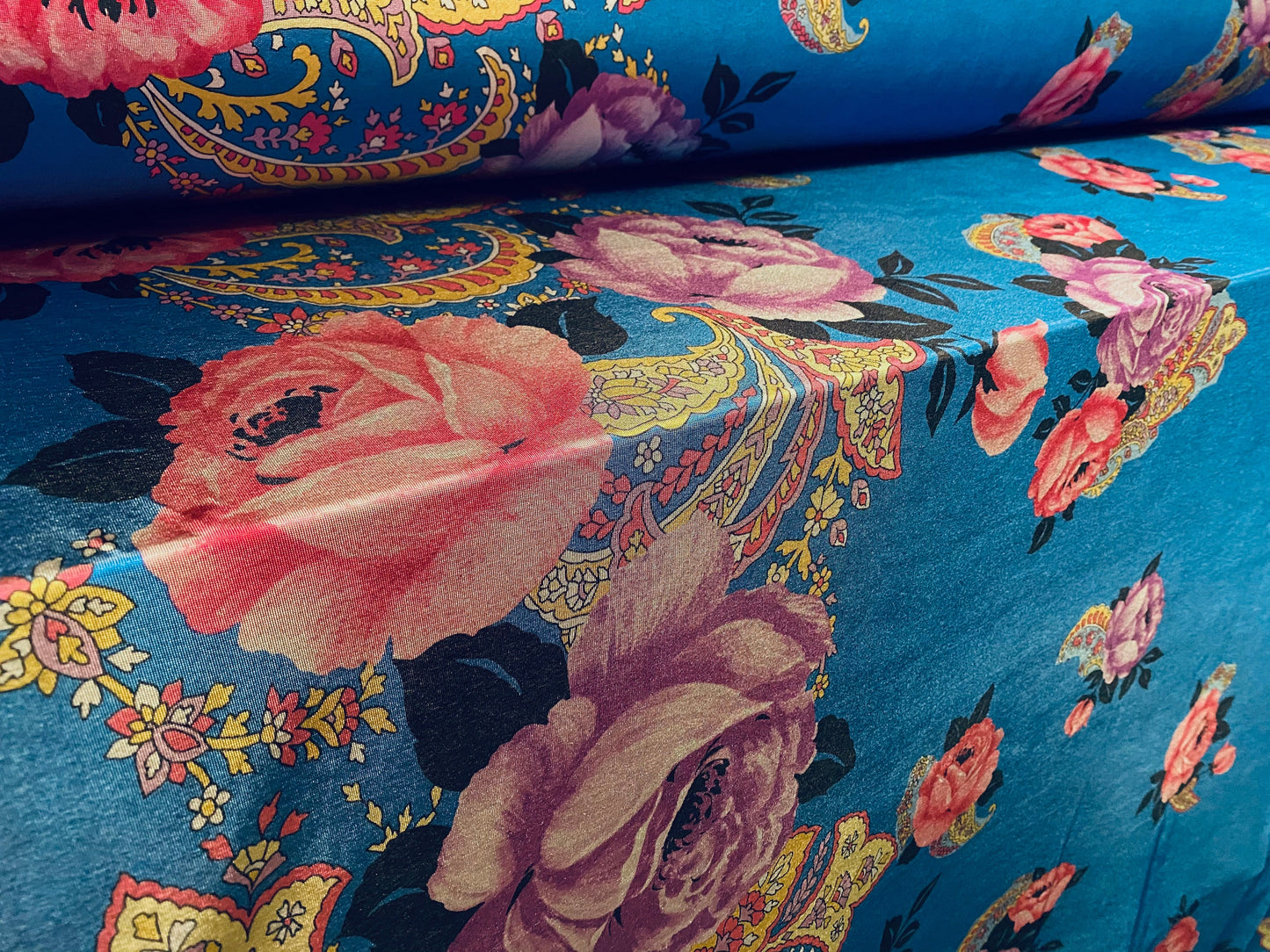 Disco shimmer spandex stretch jersey fabric, per metre - blue with pink rose double border floral print