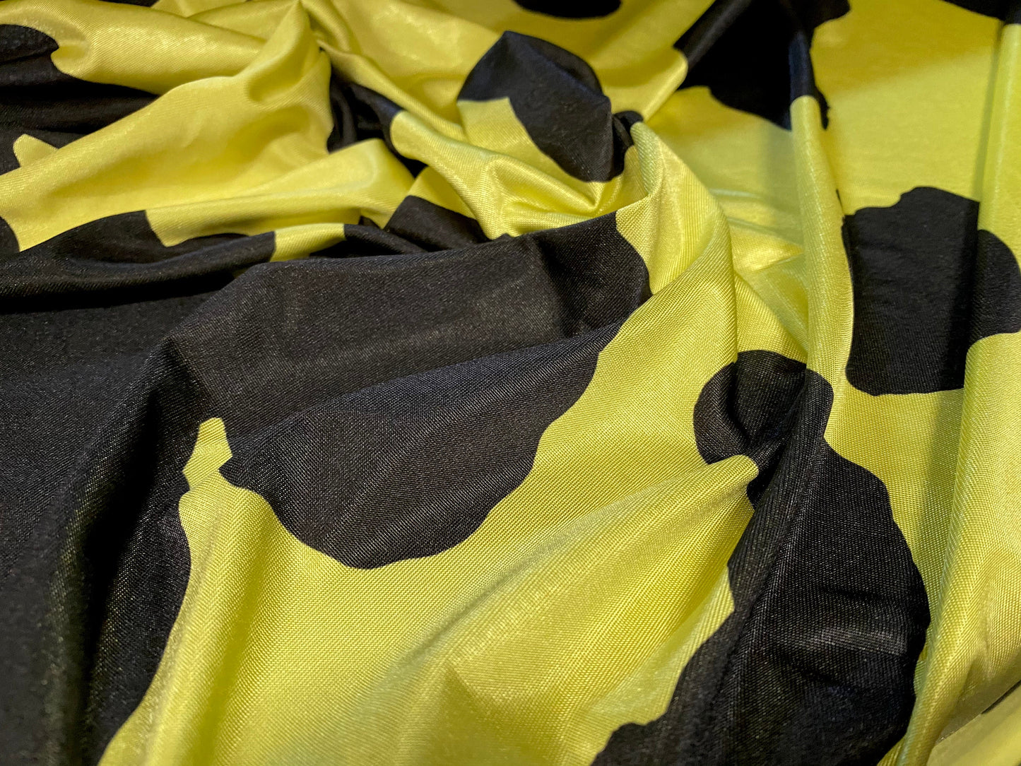 Disco shimmer stretch spandex jersey fabric, per metre - cow hide print - yellow