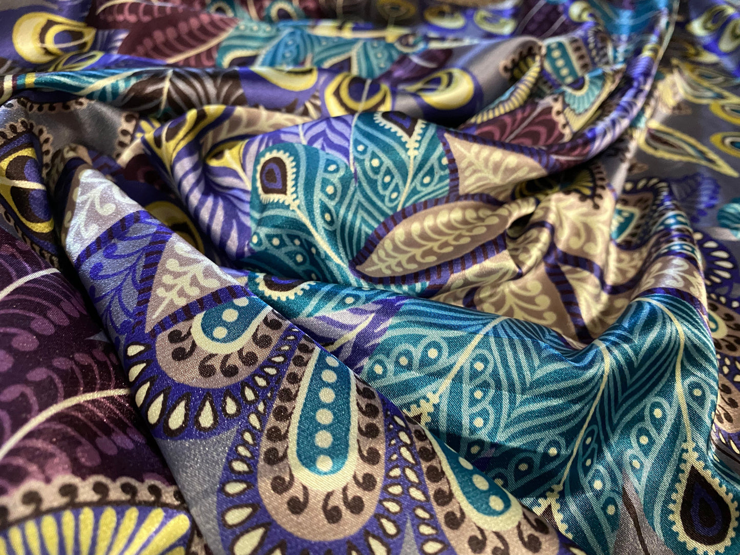 Silky Stretch satin dress fabric, per metre - peacock feathers print - black & turquoise