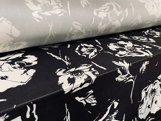 Soft touch stretch spandex jersey fabric, per metre - black with white floral print