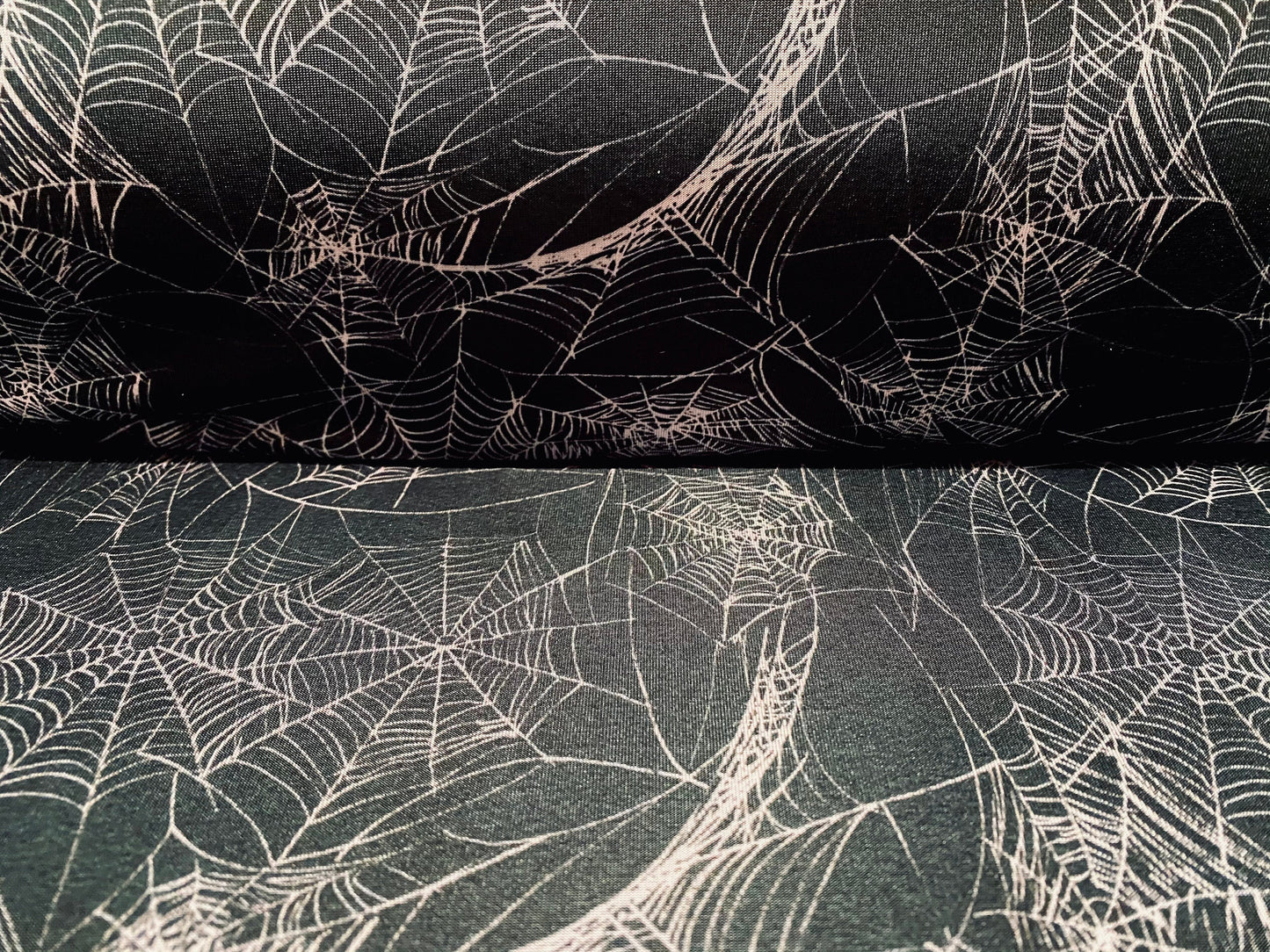 Disco shimmer spandex stretch jersey fabric, per metre - black & Nude cobweb print