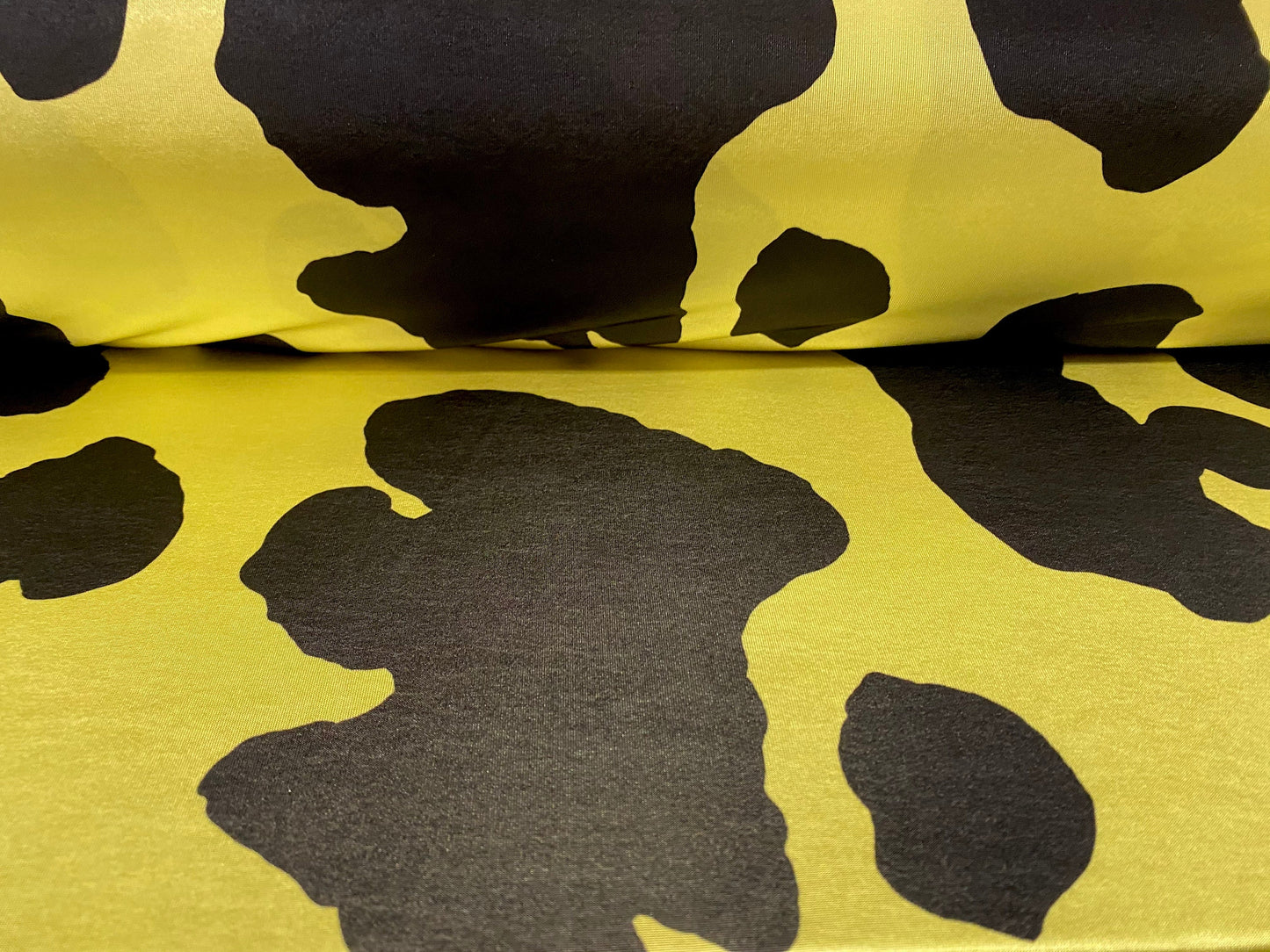 Disco shimmer stretch spandex jersey fabric, per metre - cow hide print - yellow