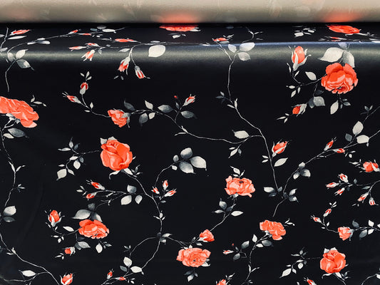 Stretch sateen woven dress fabric, per metre - black with pink rose print