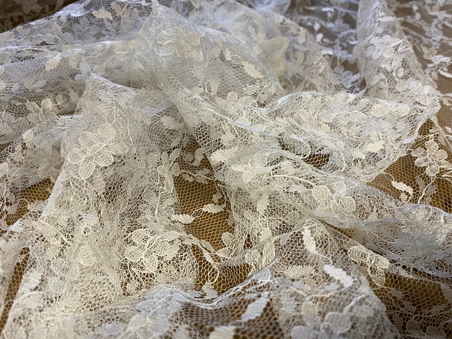 Lightweight lace net dress fabric, per metre - cream