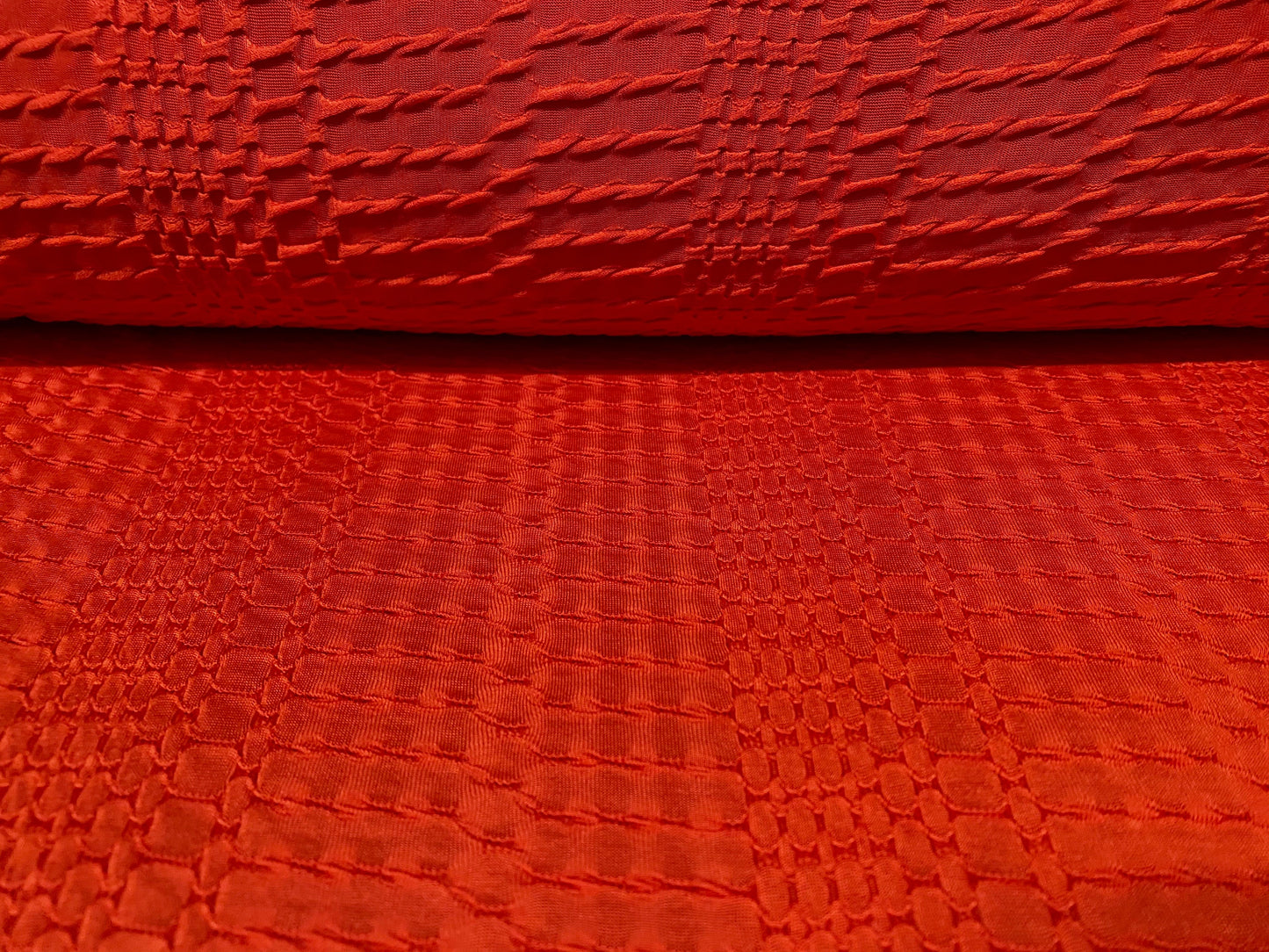 Geometric jacquard jersey dress fabric, per metre - cayenne