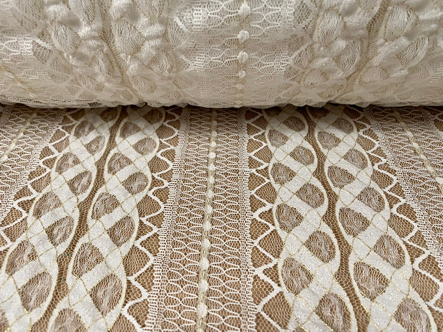 Stretch crochet lace fabric with gold metallic detailing, per metre - cream