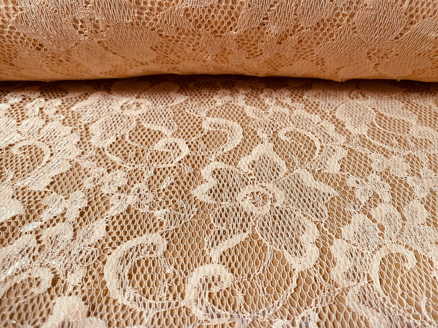 Stretch lace dress fabric, per metre - flower design - peach