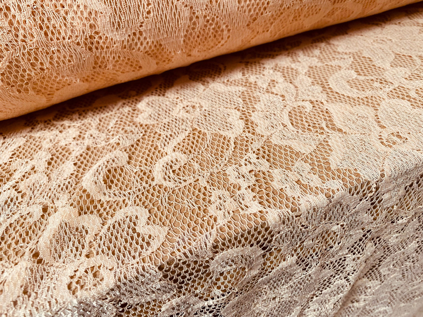 Stretch lace dress fabric, per metre - flower design - peach