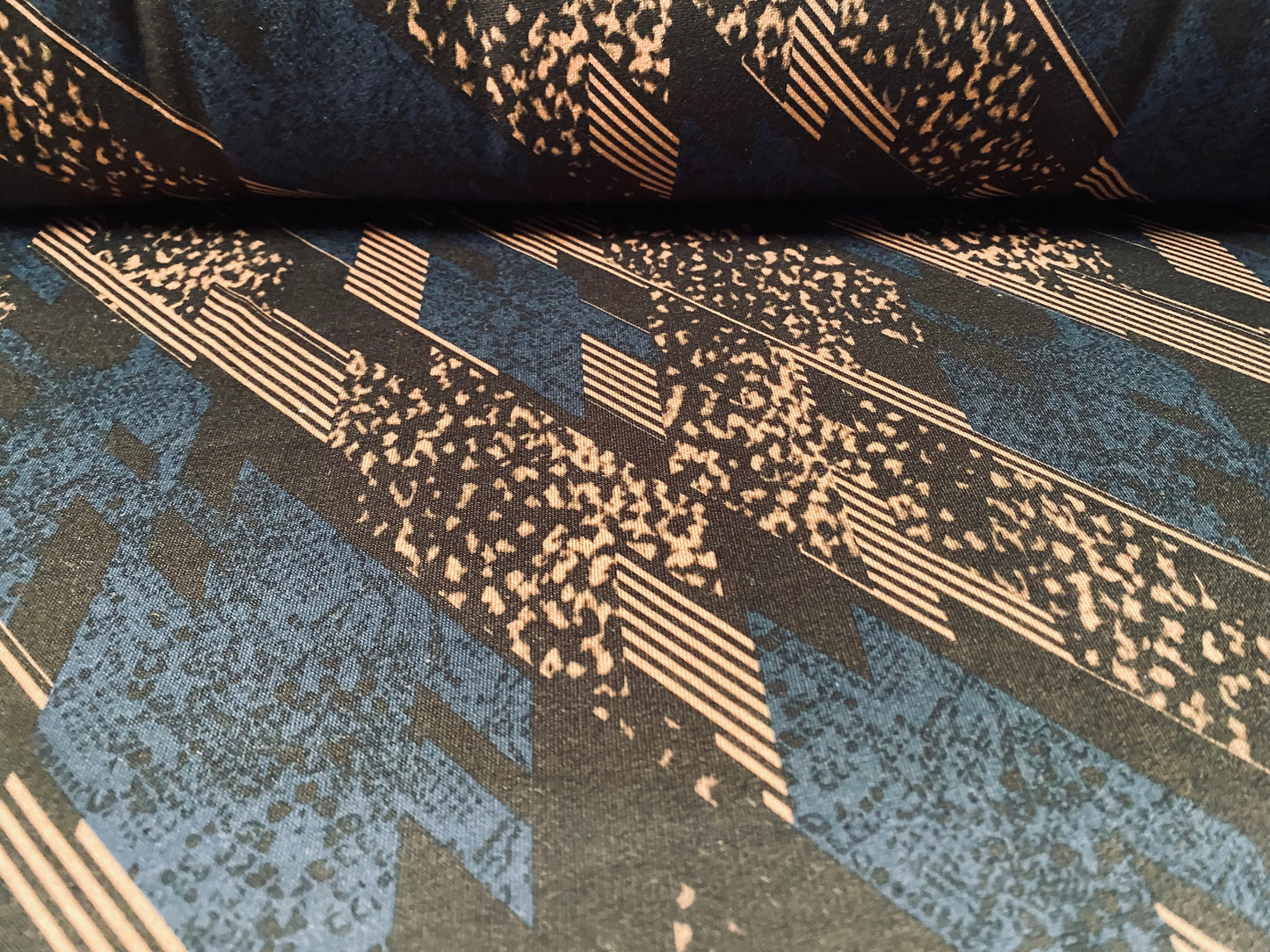 Sweatshirt fleece soft jersey fabric, per metre - Siena brown with blue black 80s retro print
