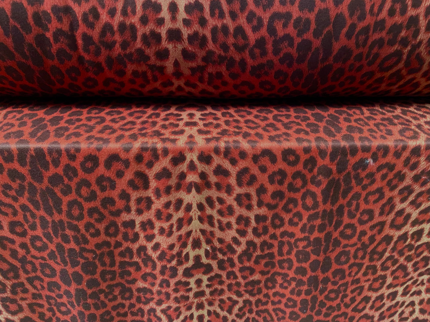 Sweatshirt fleece soft jersey fabric, per metre - Siena brown with red leopardskin animal print