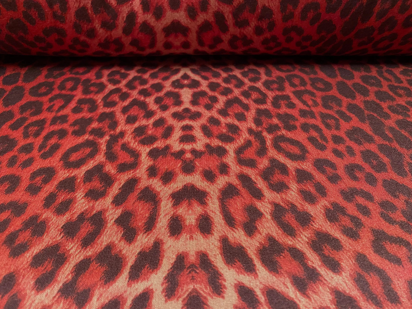 Sweatshirt fleece soft jersey fabric, per metre - Siena brown with red leopardskin animal print