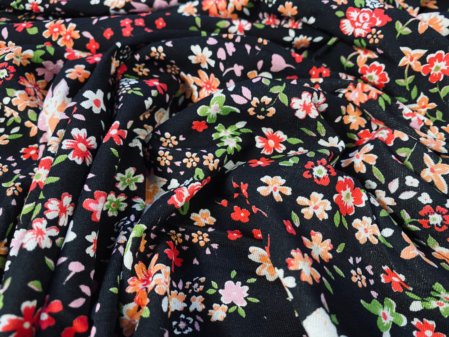 Viscose Elastane stretch jersey fabric, per metre - black with multicolour small flowers print