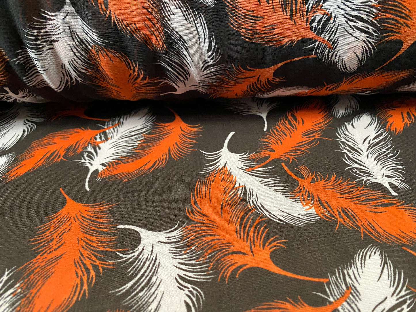Chiffon jersey dress blouse fabric, per metre - feathers print - black & Orange