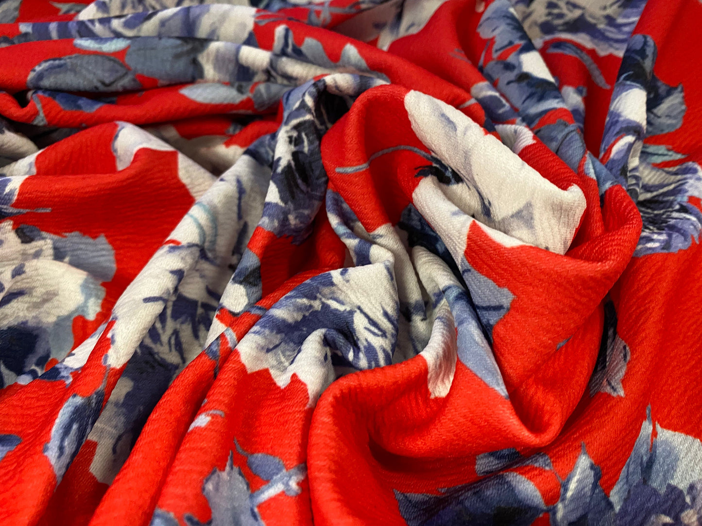 Scuba textured ‘Liverpool’ stretch spandex jersey fabric, per metre - Red with blue rose print