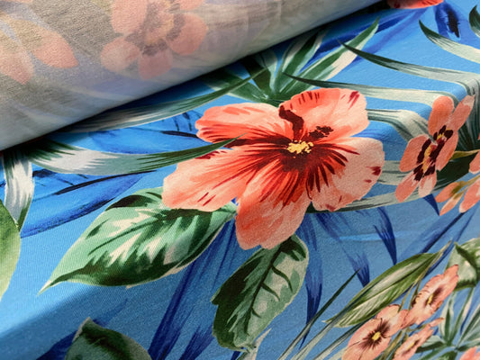 Soft handle stretch jersey fabric, per metre - blue with pink orchid print