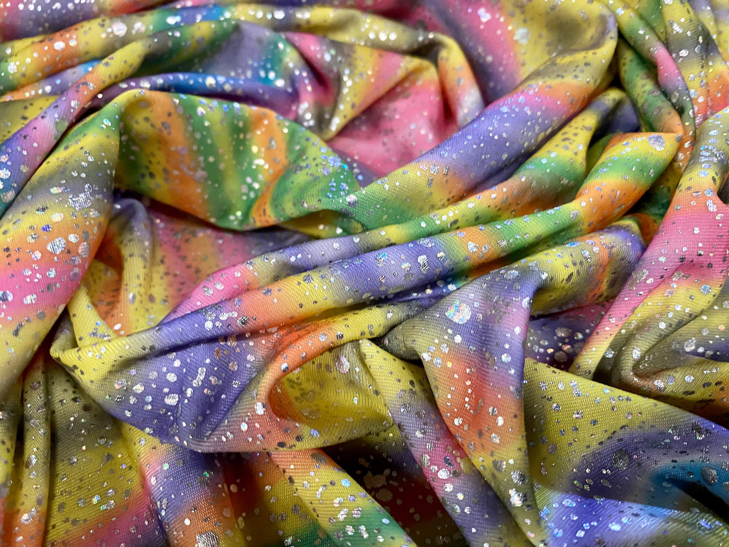 Stretch spandex jersey fabric, per metre - rainbow swirl,print with metallic splash