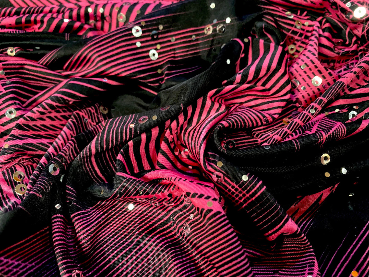 Spandex stretch ITY jersey fabric, per metre - black and cerise psychedelic print with sequins