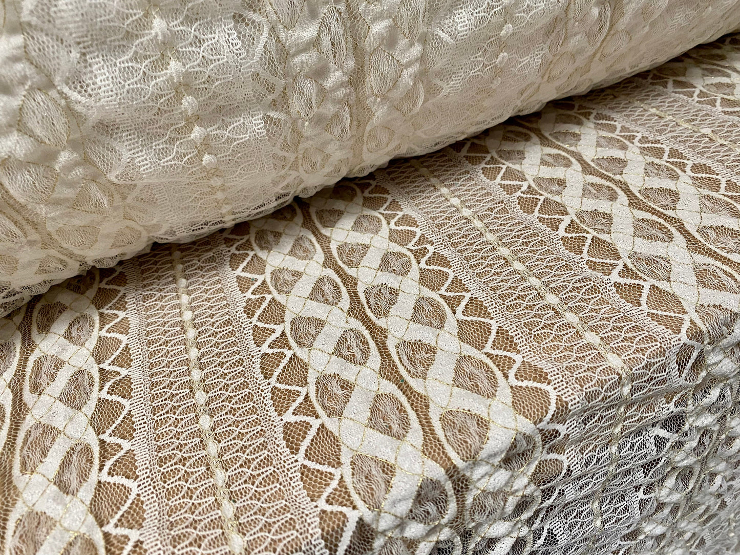 Stretch crochet lace fabric with gold metallic detailing, per metre - cream