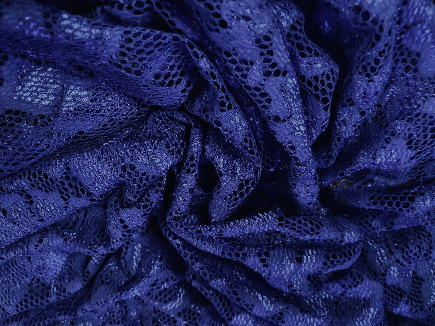 Stretch lace dress fabric, per metre - flower design - royal blue