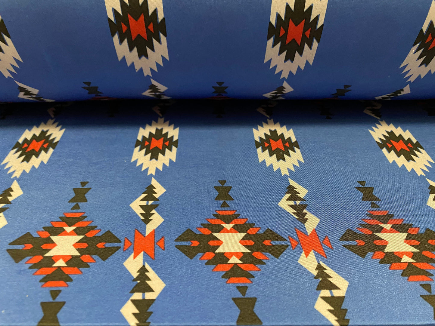 Disco shimmer stretch jersey fabric, per metre - Aztec Inca print - blue