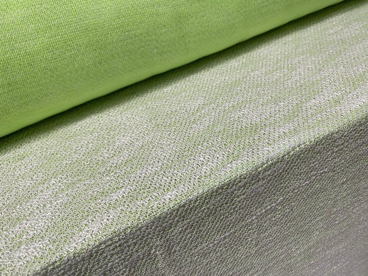 Melange double jersey fabric with looped face, per metre - green