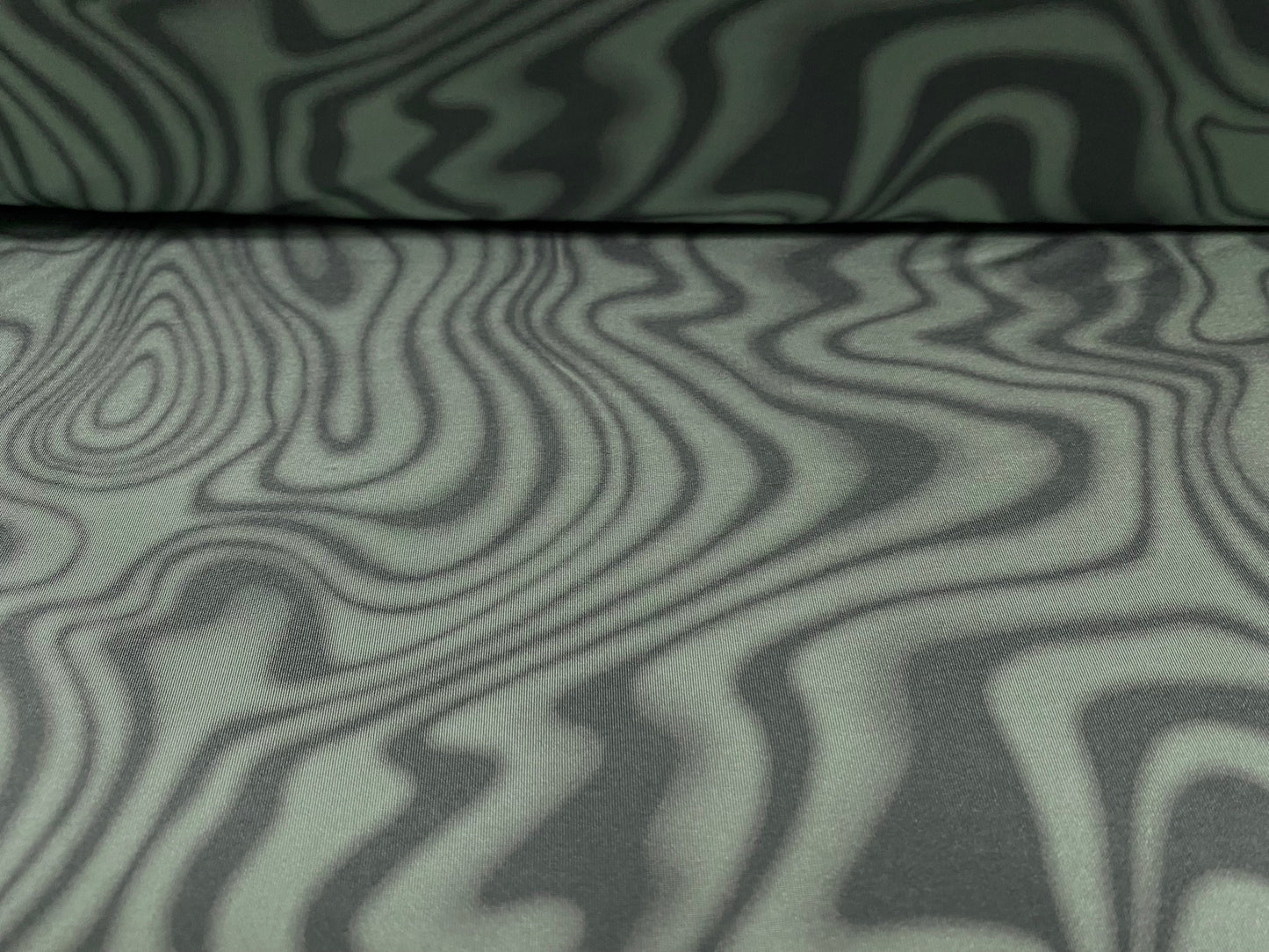 Disco shimmer stretch jersey fabric, per metre - swirl print - sage & olive green