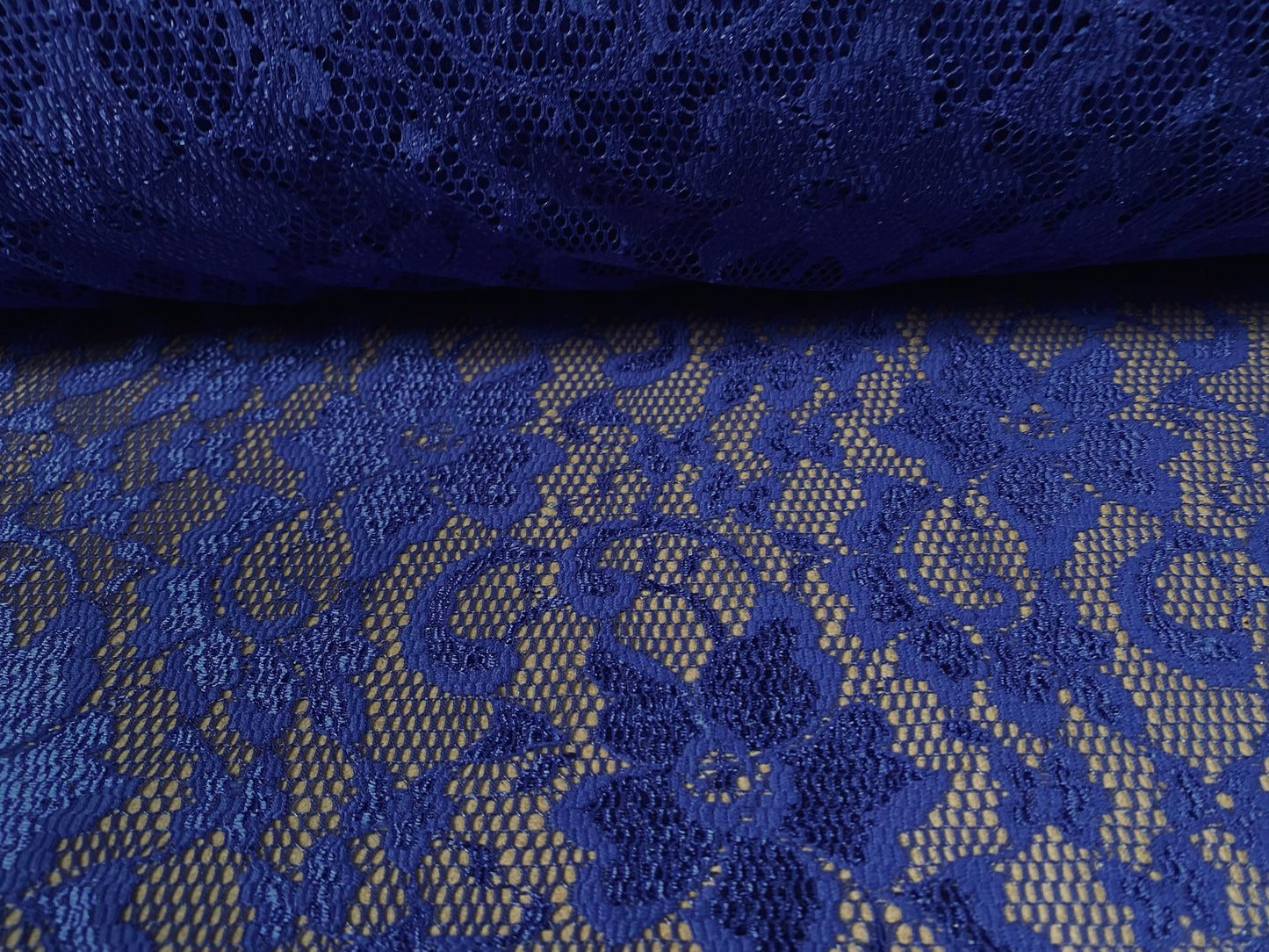 Stretch lace dress fabric, per metre - flower design - royal blue