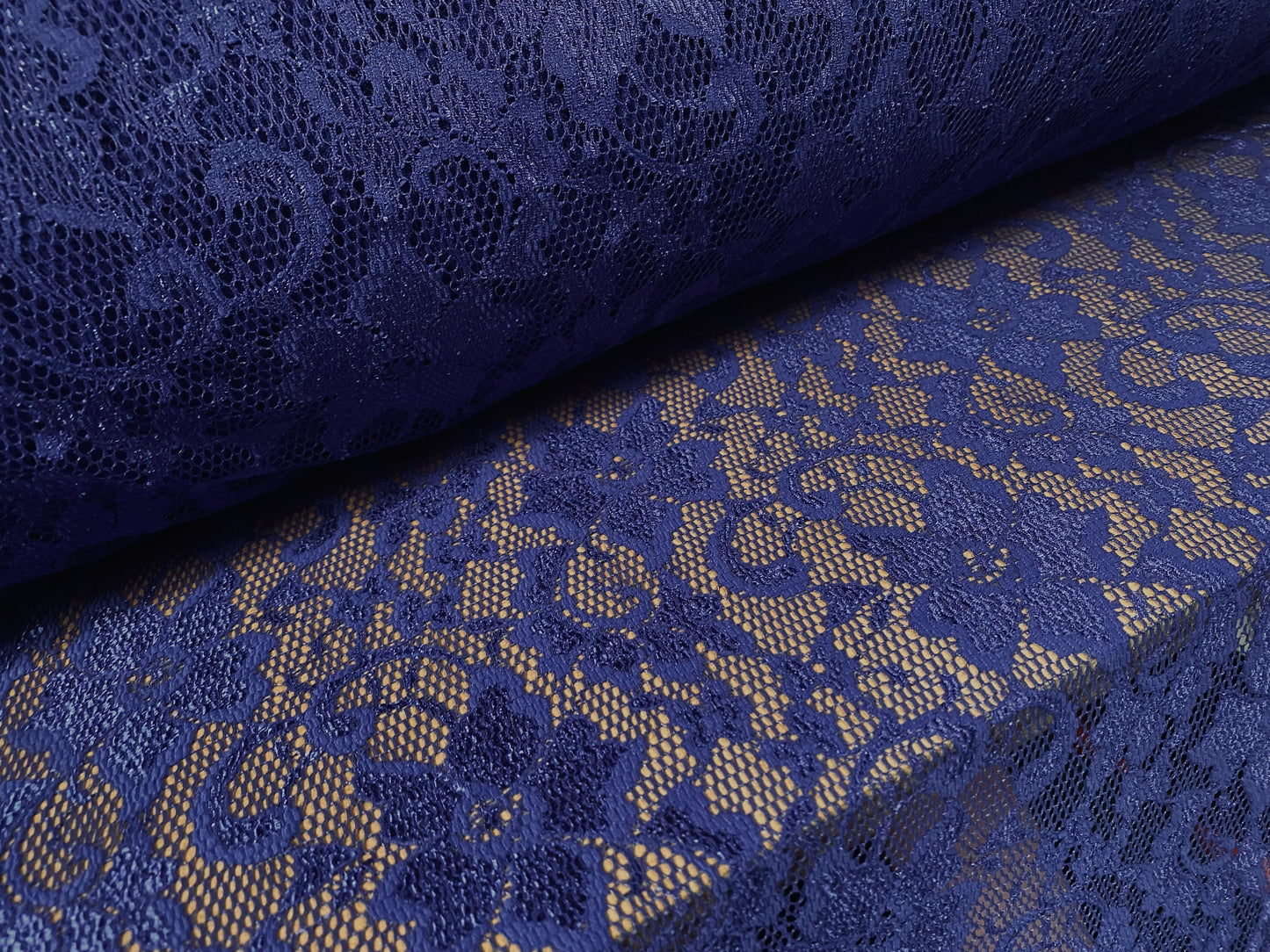 Stretch lace dress fabric, per metre - flower design - royal blue