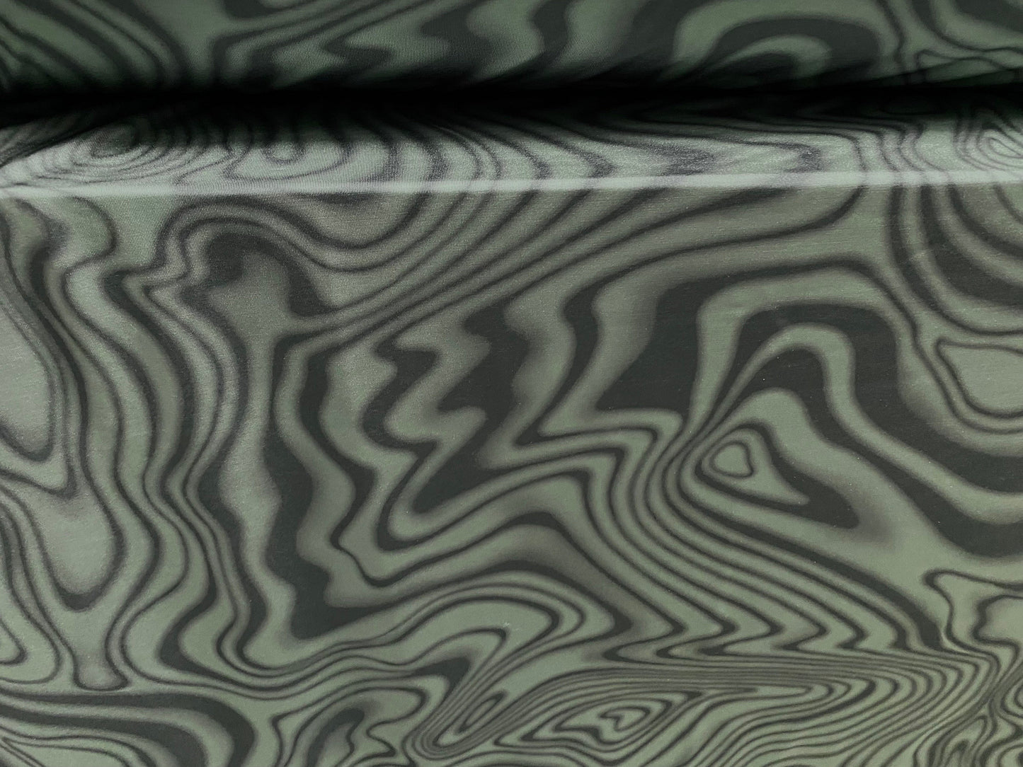 Disco shimmer stretch jersey fabric, per metre - swirl print - sage & olive green