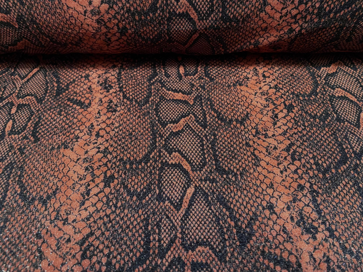 Shimmer snakeskin print spandex stretch crepe jersey fabric, per metre - coral & black