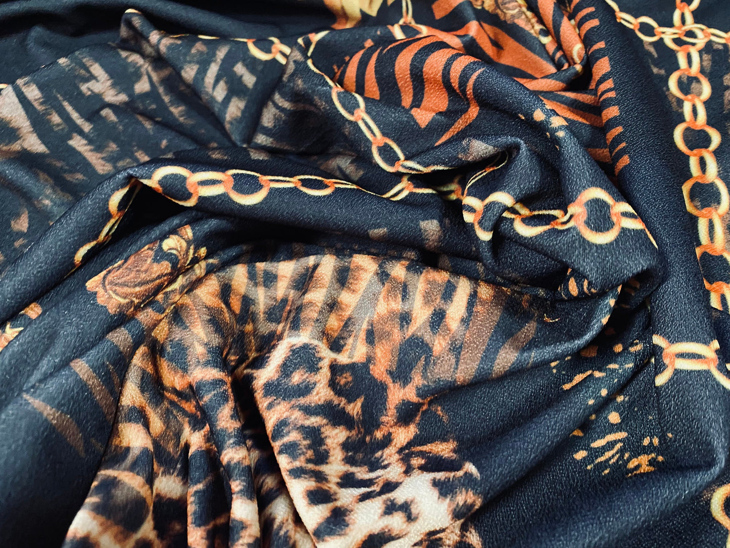 Scuba crepe fabric stretch spandex jersey, per metre - Designer chains and animal print - black & gold