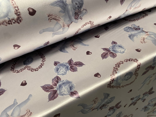 Silky Stretch charmeuse satin dress fabric, per metre - Cupid in a love heart print - silver blue