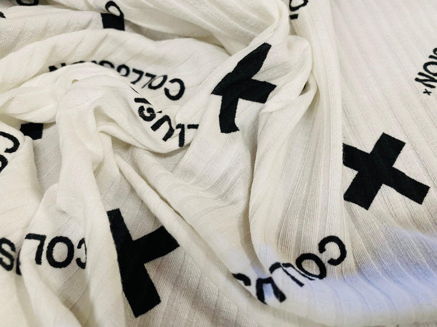 Spandex stretch rib jersey fabric, per metre - x symbol print - white & black