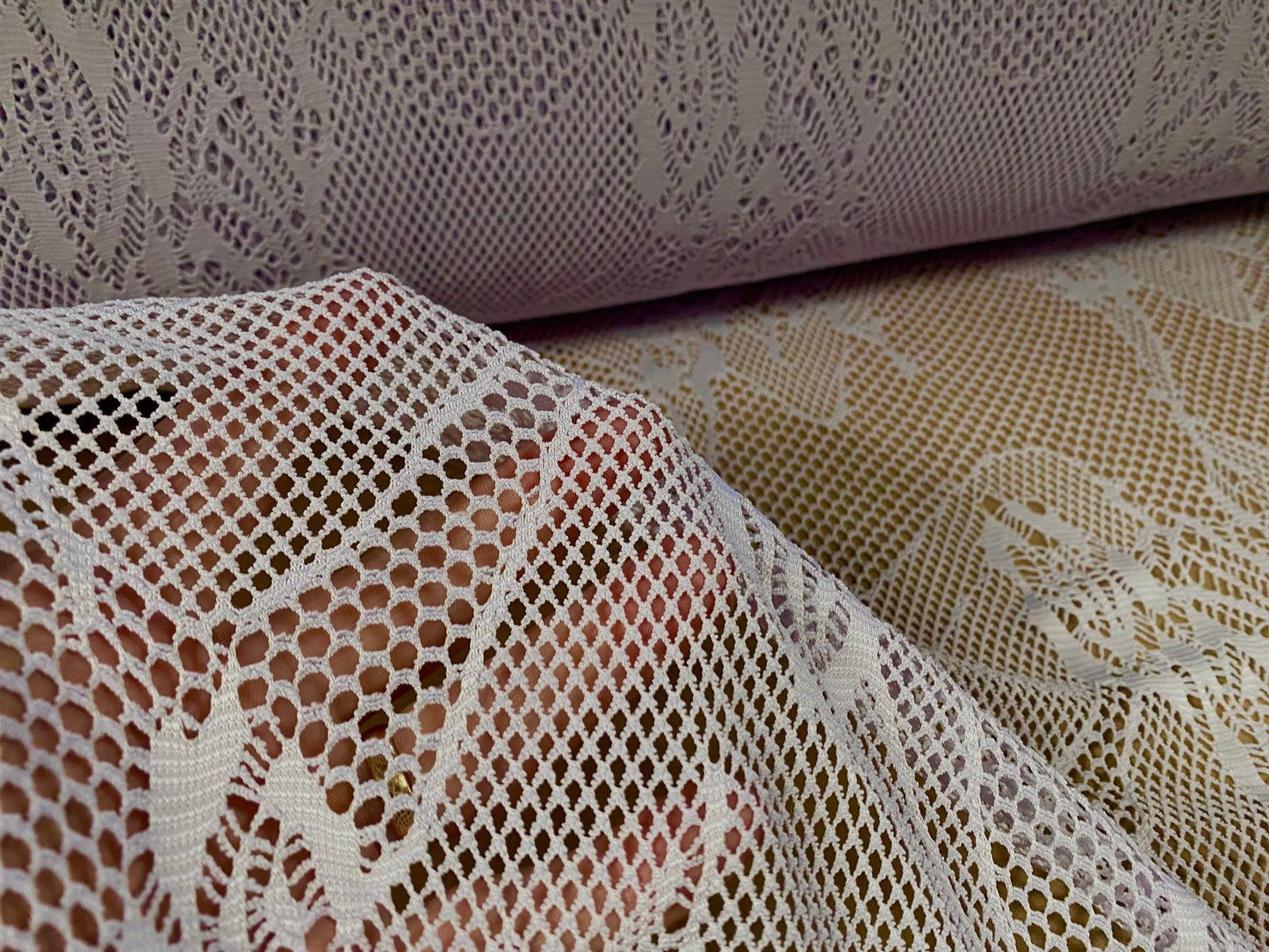 Fishnet 4 way stretch jersey fabric with floral design, per metre - pale lavender