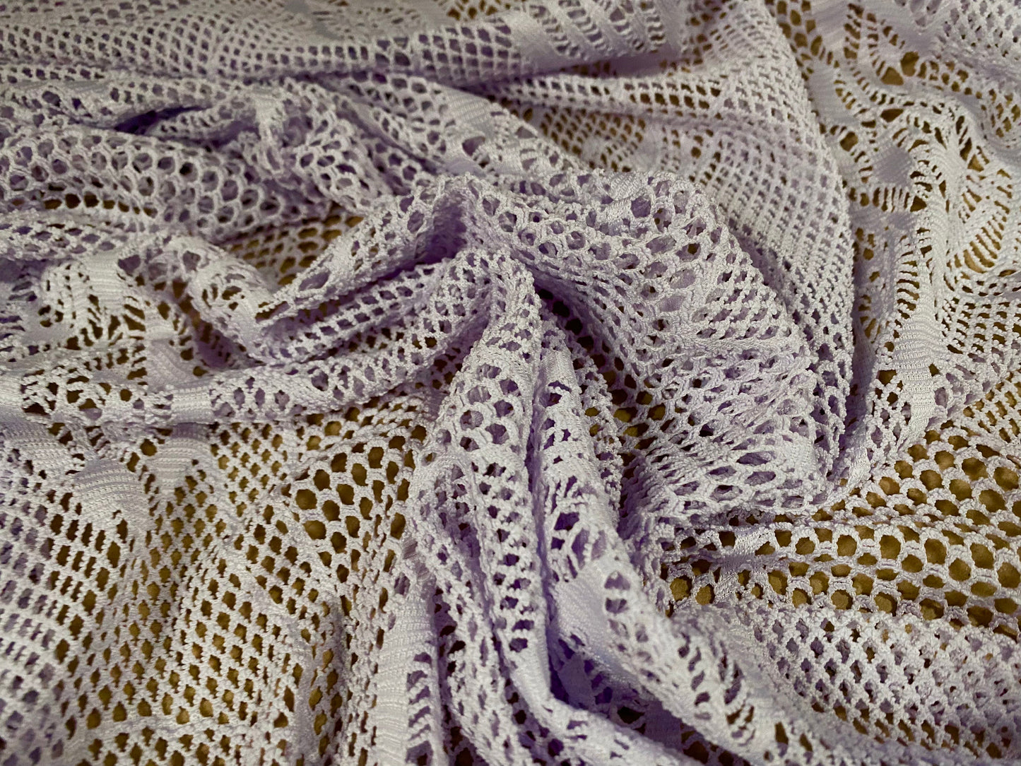 Fishnet 4 way stretch jersey fabric with floral design, per metre - pale lavender