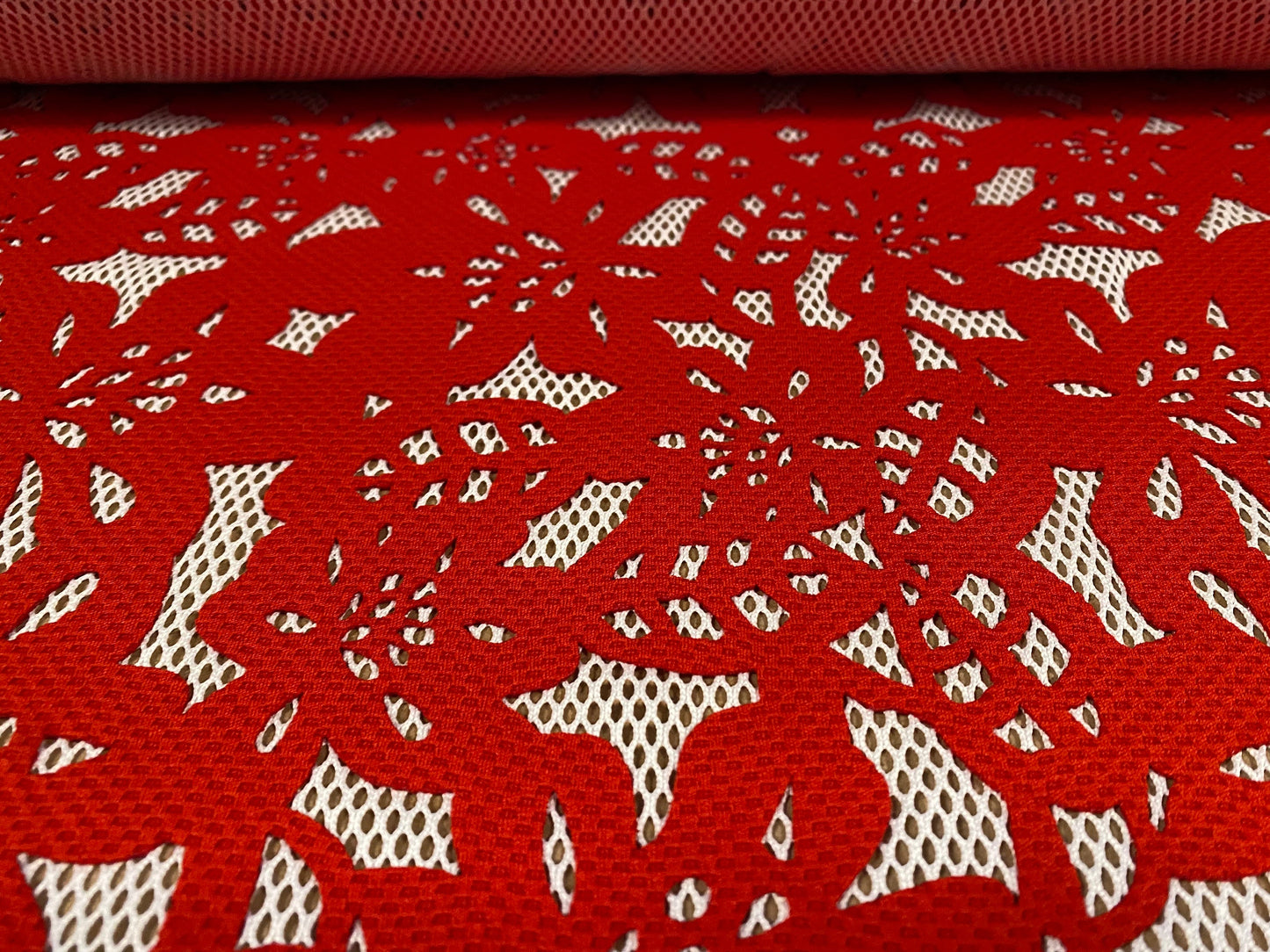 Fishnet fabric with bonded floral overlay, per metre - flower design - red on white