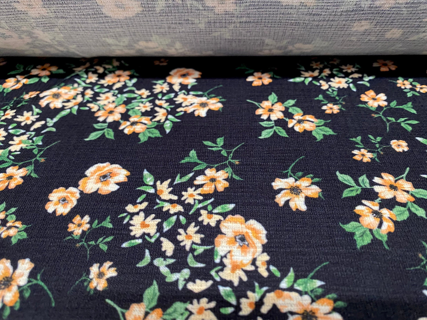 Stretch spandex textured single jersey fabric, per metre - ditsy floral print - black & peach