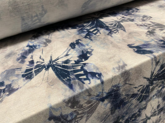 Soft handle stretch jersey fabric, per metre - distressed butterfly print - Petrol blue grey