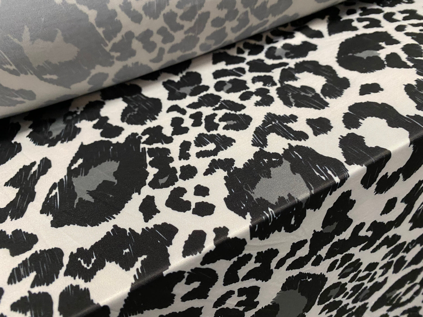 Soft touch stretch spandex jersey fabric, per metre - leopard skin animal print - grey