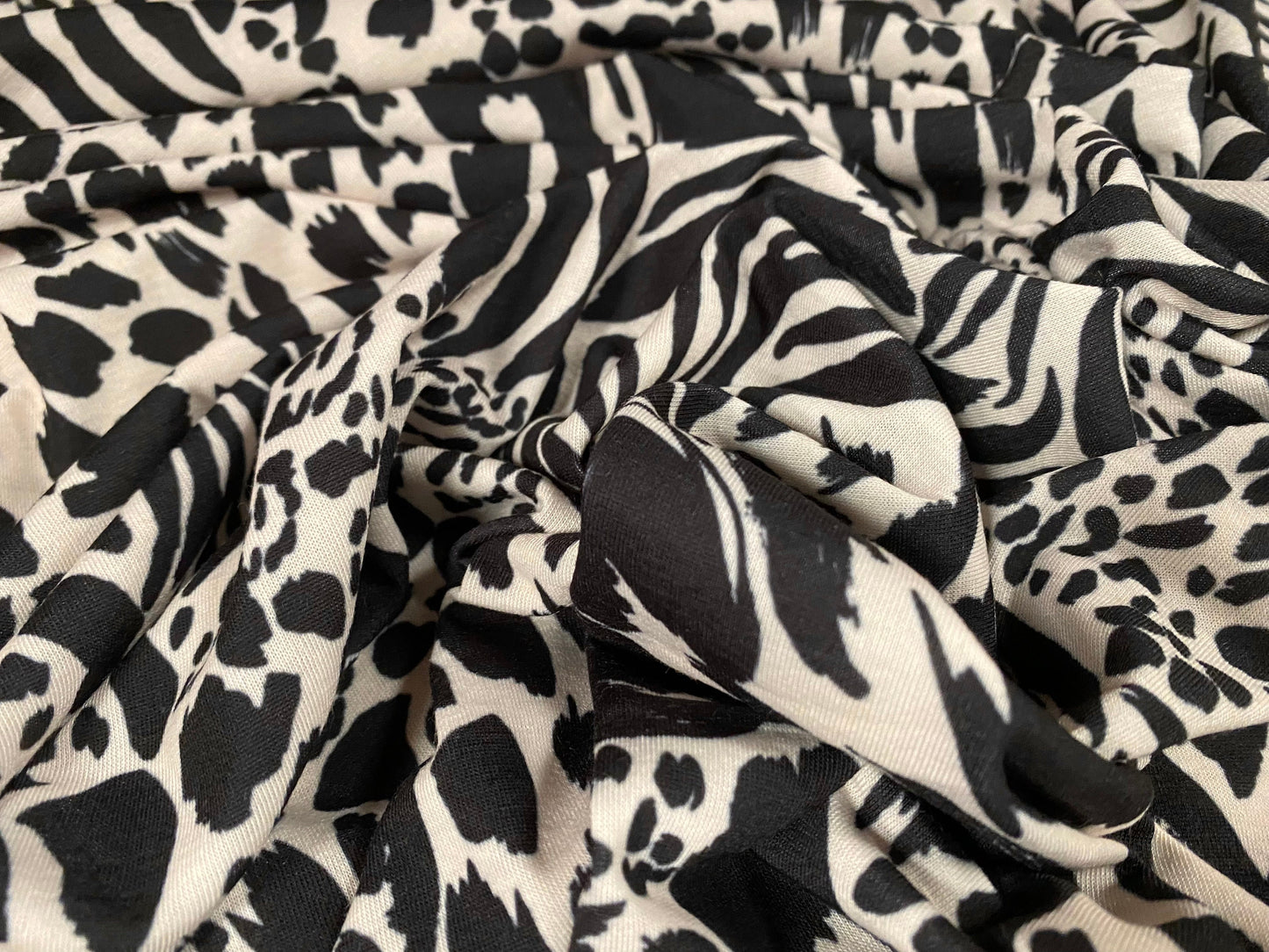 Soft handle stretch jersey fabric, per metre - leopard zebra fusion print - Cream & black