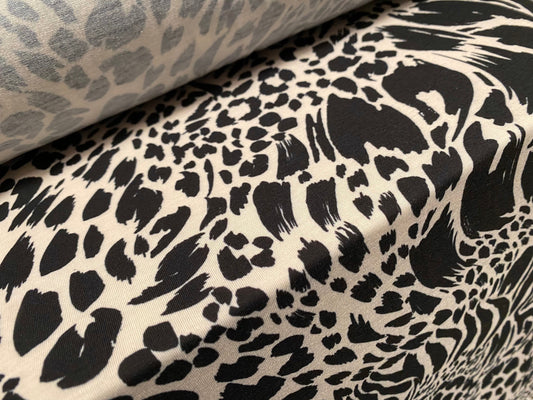 Soft handle stretch jersey fabric, per metre - leopard zebra fusion print - Cream & black