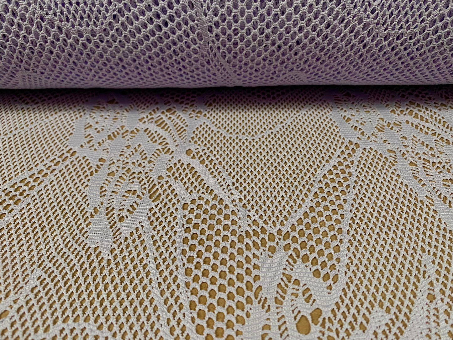 Fishnet 4 way stretch jersey fabric with floral design, per metre - pale lavender