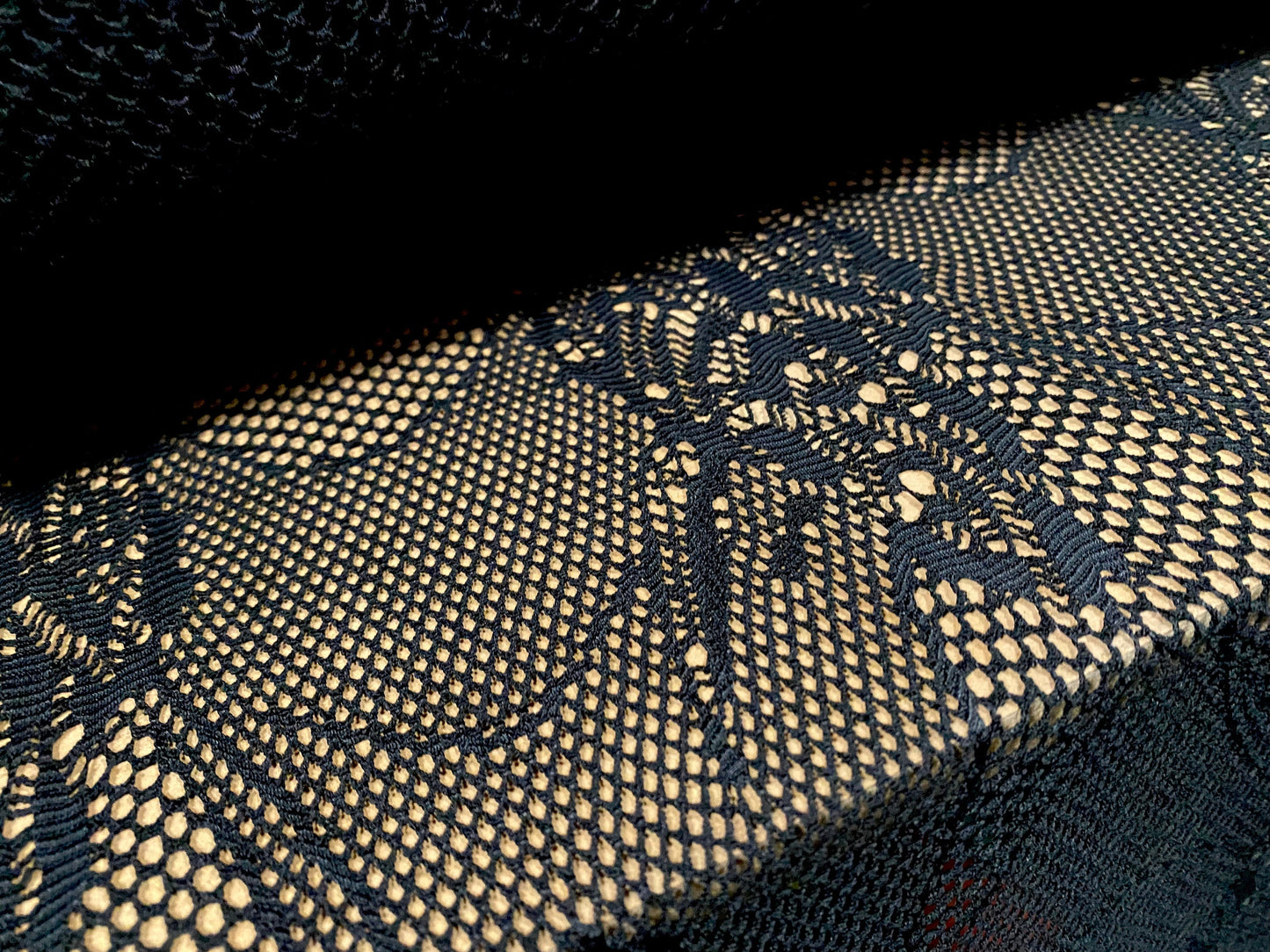 Fishnet 4 way stretch jersey fabric with floral design, per metre - black