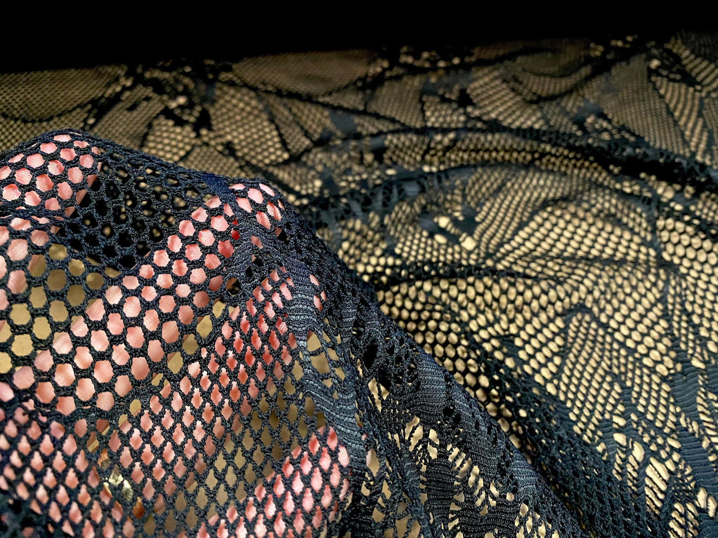 Fishnet 4 way stretch jersey fabric with floral design, per metre - black